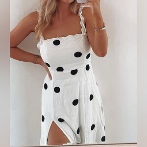 Princess Polly White Polka Dot Dress with slit. NWT. Size 8 AUS/4 US